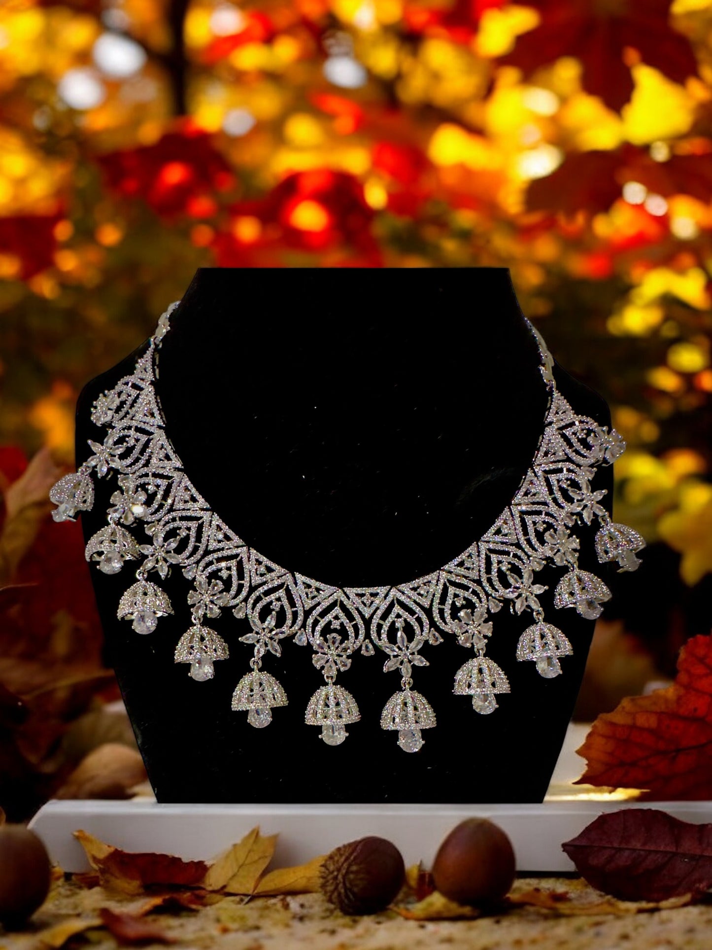 Heartfully designed CZ Neckset with Jhumka Hangings with Green White CZ Flowers