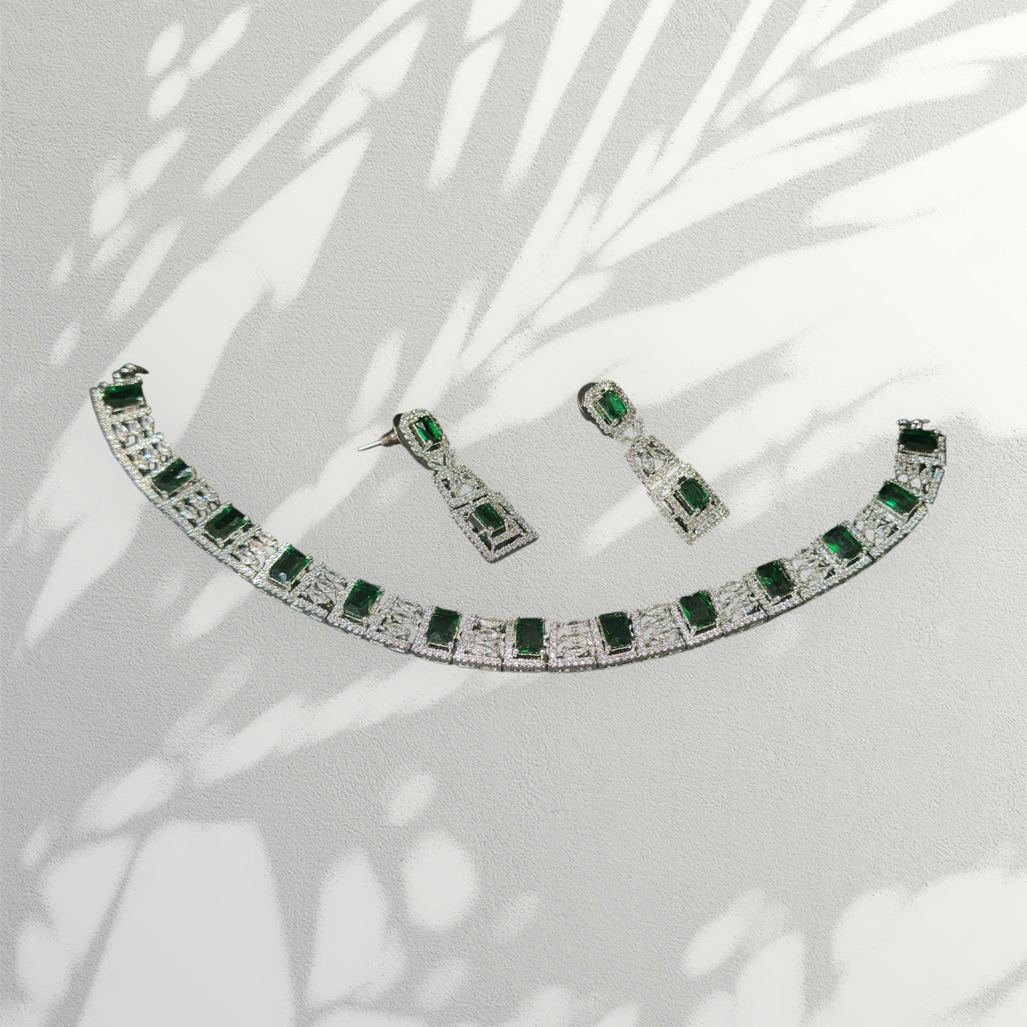 Handcrafted necklace complemented by green stones