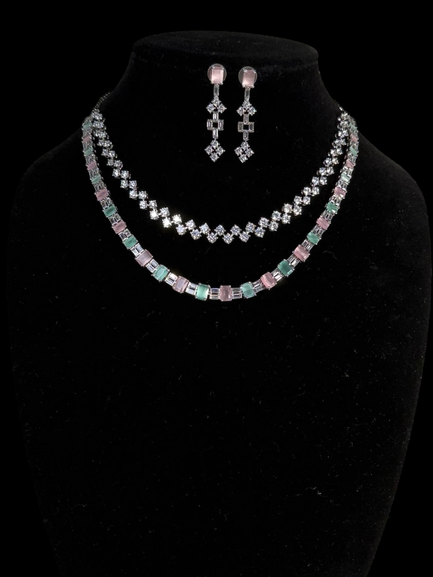 Dual layered neck chain with all white CZs on top layer and color variant on the bottom layer.