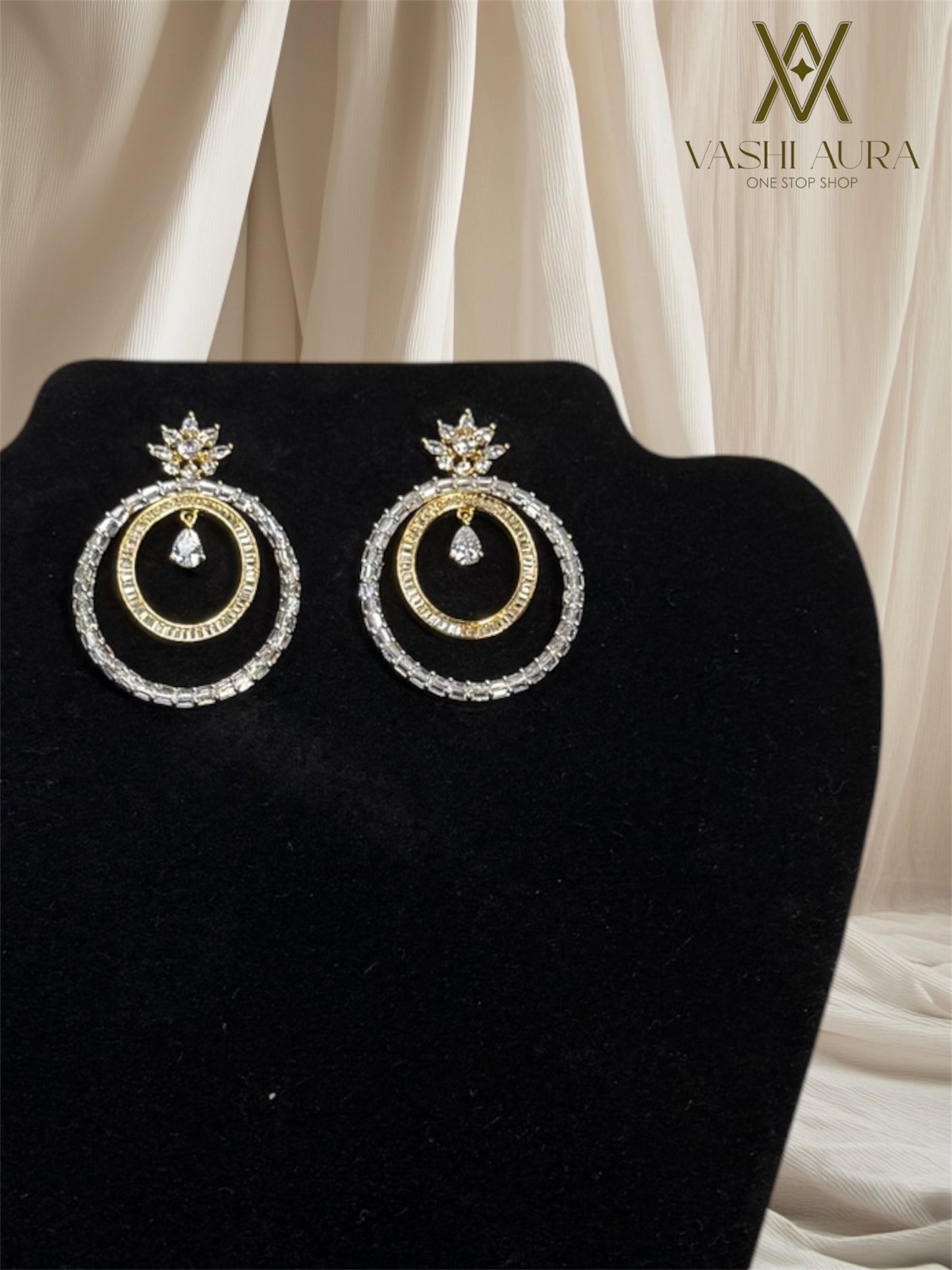 Dual Hoop Earrings With a White CZ Drop Hanging In The Center