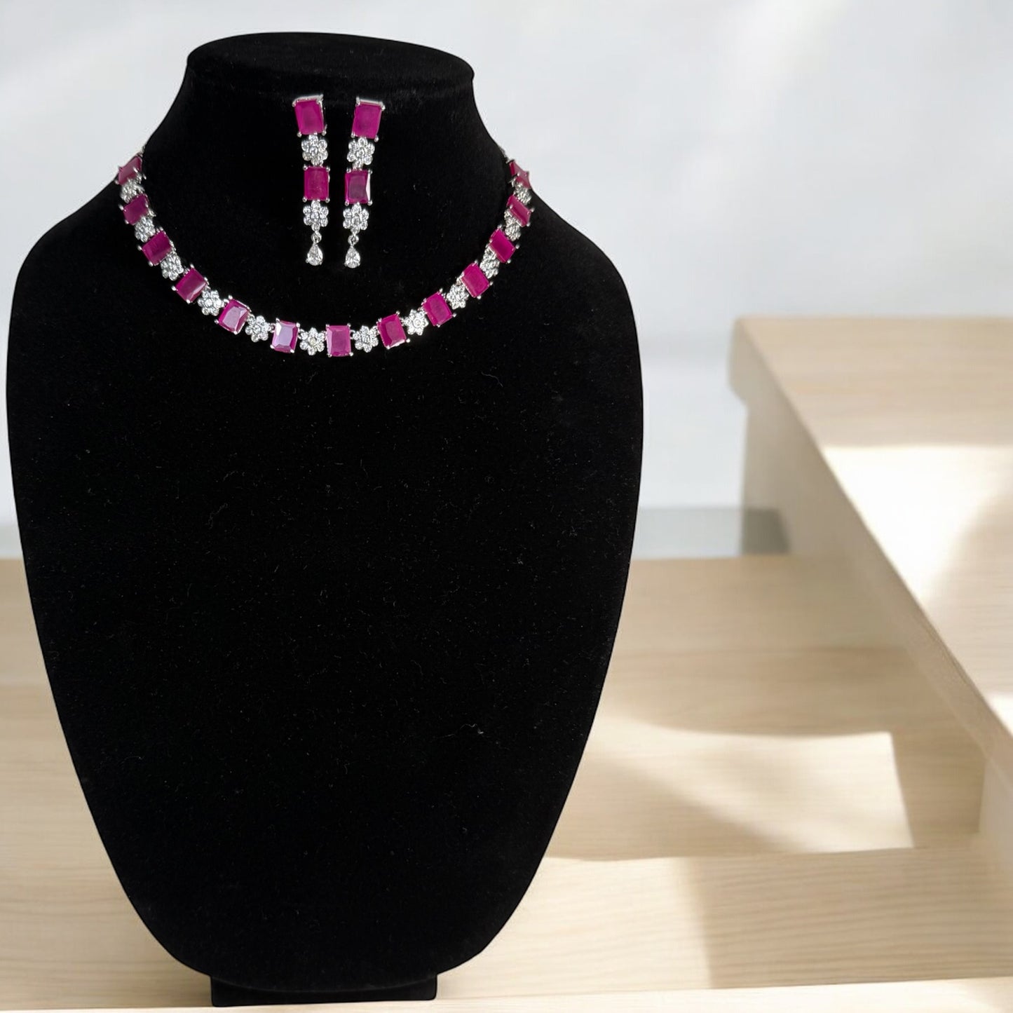 Single layered CZ Neckset complemented with pink stones