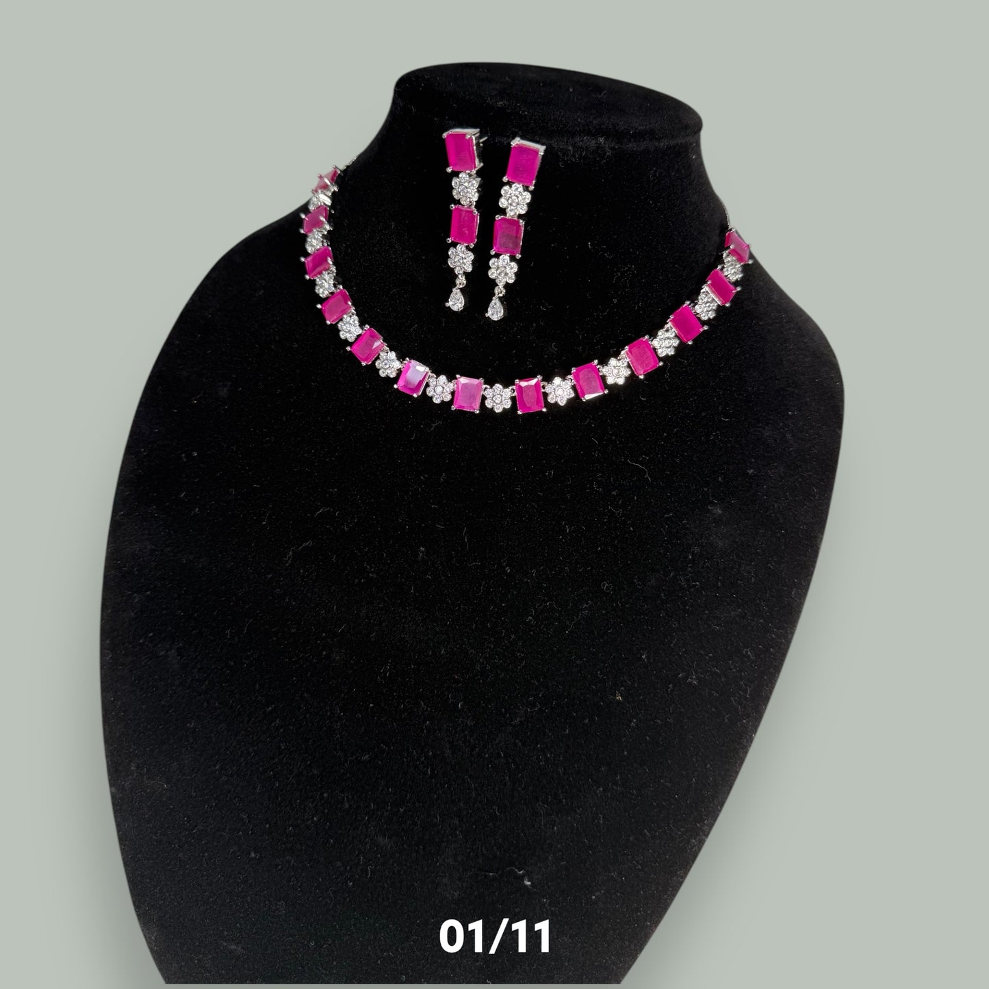 Single layered CZ Neckset complemented with pink stones