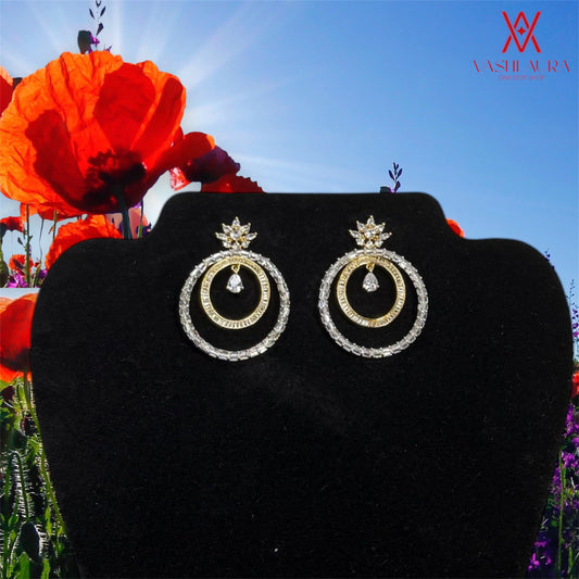 Dual Hoop Earrings With a White CZ Drop Hanging In The Center